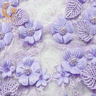 Il tessuto ricamato/porpora del pizzo del fiore 3D merletta il poliestere materiale per il vestito da sera