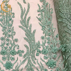 Larghezza nuziale del tessuto 140Cm del pizzo del vestito in rilievo verde elegante dal ODM