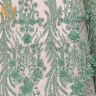 Larghezza nuziale del tessuto 140Cm del pizzo del vestito in rilievo verde elegante dal ODM
